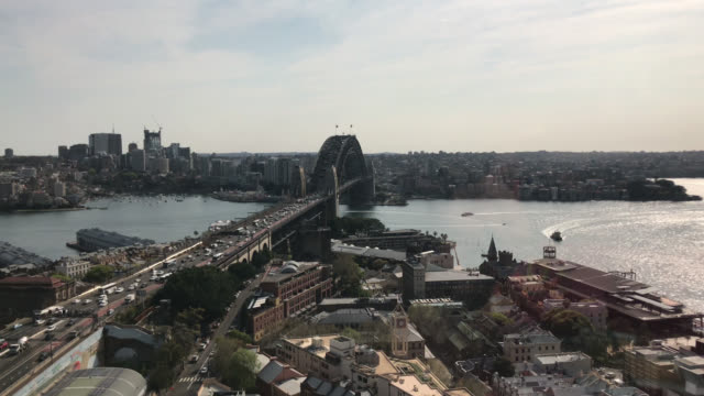 Sydney-city-skyline-at-harbour-during-sunrise.