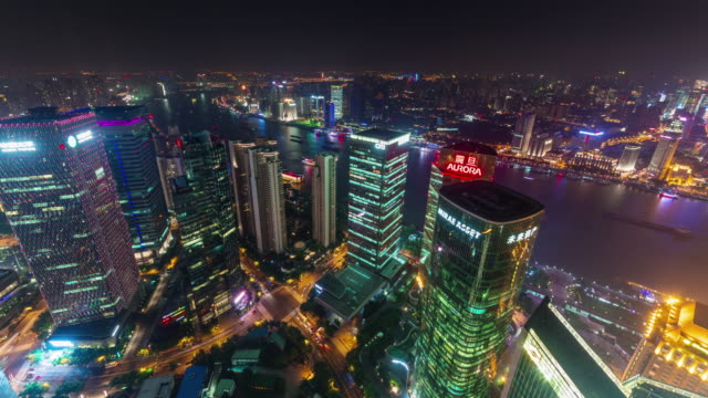 China-Shangai-paisaje-noche-iluminación-techo-superior-arial-panorama-4k-lapso-de-tiempo
