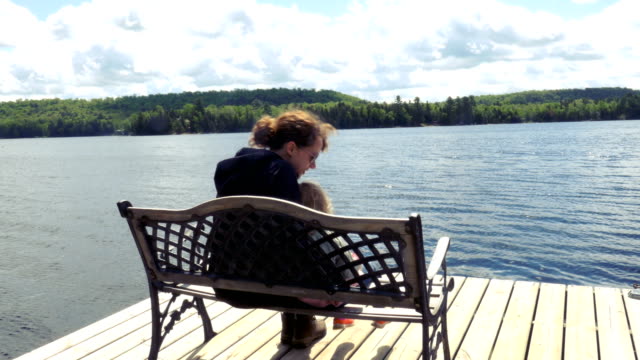 Mother-and-Child-Sitting-on-a-Pier-Bench-on-Georgian-Bay