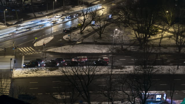 Night-time-lapse-of-busy-crossroad-in-Warsaw