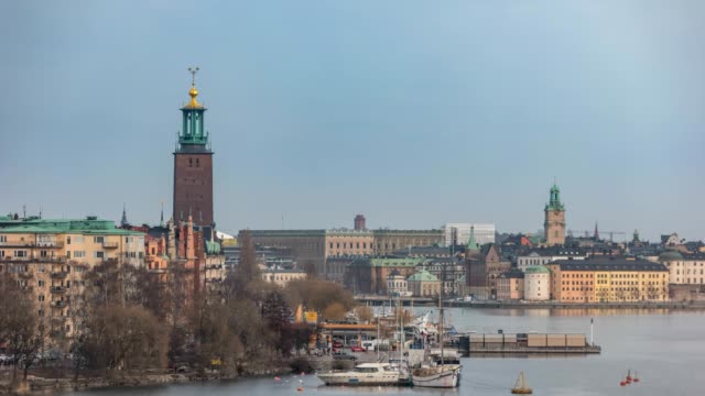 Stockholm-city-skyline-timelapse-at-Stockholm-City-Hall-and-Gamla-Stan,-Stockholm-Sweden-4K-Time-Lapse