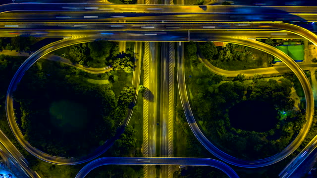 Aerial-view-Time-lapse-of-the-expressway,-motorway-and-highway-in-the-detail-of-circus-intersection