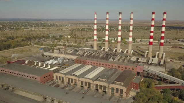 industrial-air-pollution-concept,-factory-near-the-city,-aerial-view