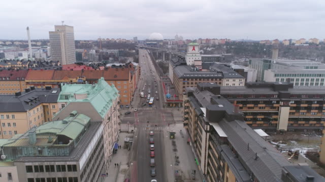 Stockholm-Södermalm-aerial-view.-Drone-shot-over-city-street-and-bridge-in-Stockholm,-Sweden
