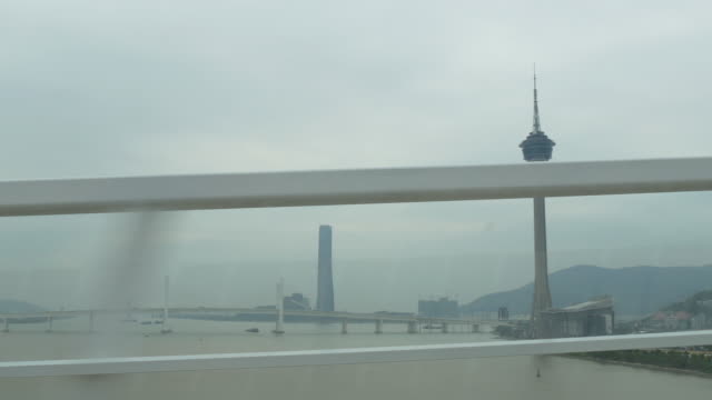 China-día-tiempo-Macao-carretera-viaje-parte-trasera-lado-puente-torre-panorama-4k