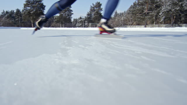 Speed-Skater-Practicing-on-Ice-Rink