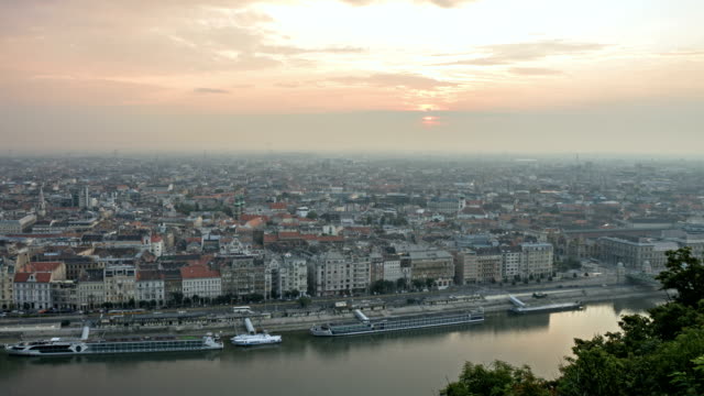 Mist-over-modern-european-city-on-sunrise.-Time-lapse