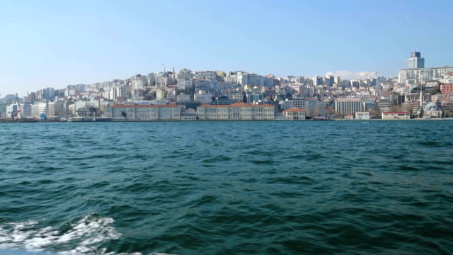 Old-and-new-Istanbul-view,-view-from-sailing-boat,-awesome-overbuilt-coastline