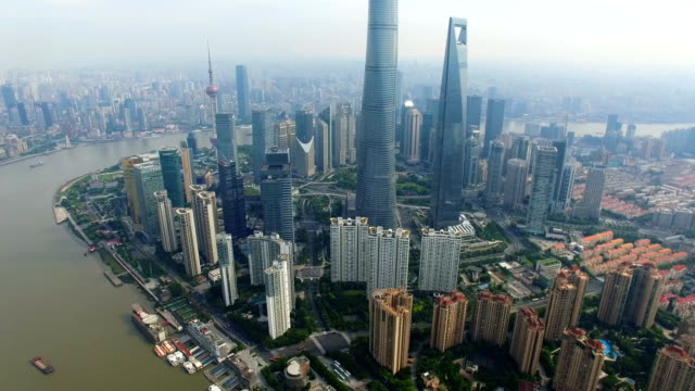 Toma-aérea-del-Bund-de-Río-Huangpo-y-el-paisaje-urbano/Shanghai,-China