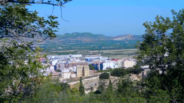 Small-provincial-town-at-the-foot-of-the-mountains-in-Spain