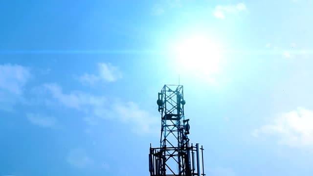 Sun-&-Clouds-with-network-tower