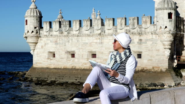 Female-tourist-studying-a-map