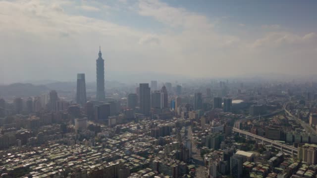 sunny-day-taipei-cityscape-downtown-aerial-panorama-4k-timelapse-taiwan