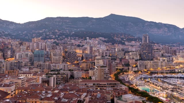 Monaco-Ville-Stadt-Skyline-von-Tag-zu-Nacht-Zeitraffer,-Monte-Carlo,-Monaco-4K-Zeitraffer