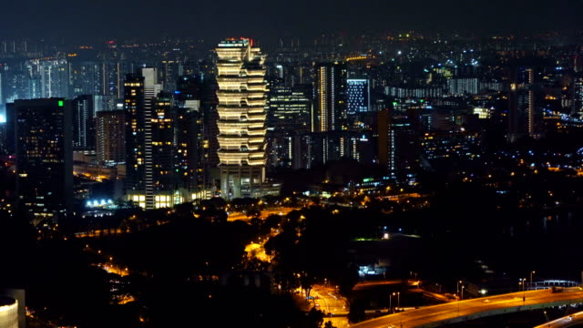 Innenstadt-von-Singapur-City-Marina-Bay-Area.-Financial-District-und-Wolkenkratzer-Gebäude.-Luftaufnahme-in-der-Nacht.
