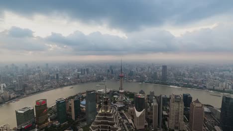 City-skyline-at-sunset,-Shanghai,-China