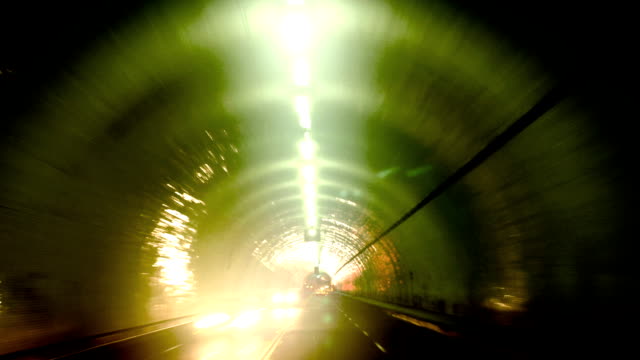 Driving-through-a-dark-tunnel-at-night