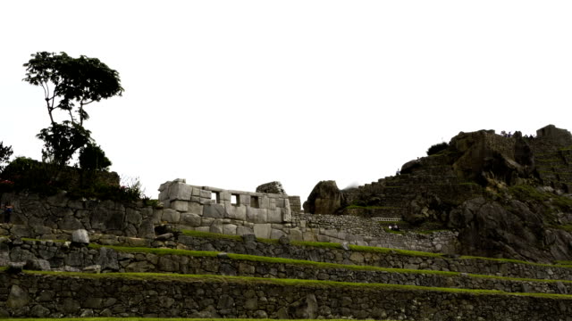 Machu-Picchu-Personen,-die-In-den-Inka-Ruinen-Zeitraffer-drei-Fenster