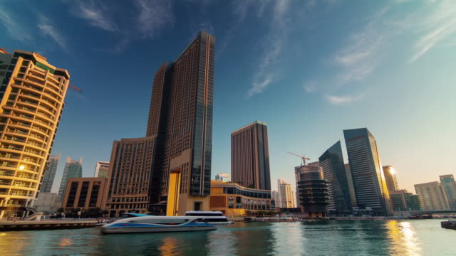 dubai-marina-water-traffic-yacht-boat-sunset-panorama-4k-time-lapse-united-arab-emirates