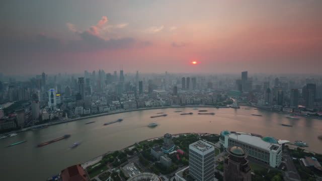 china-shanghai-city-sunset-traffic-cargo-river-bay-roof-top-panorama-4k-time-lapse
