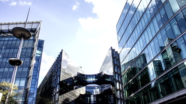 Business-Buildings-Glass-Skyscraper-and-Clouds,-Time-Lapse