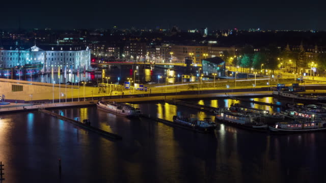 netherlands-night-amsterdam-dock-roof-top-panorama-4k-time-lapse