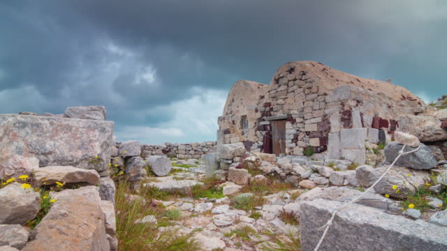 day-time-storm-sky-santorini-island-old-stone-house-top-panorama-4k-time-lapse-greece
