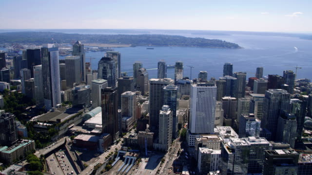 Oceanfront-City-Skyline-Buildings-Sunny-Day-Aerial