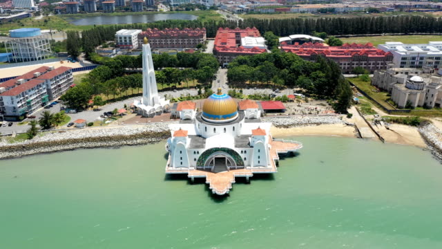 Aerial-view-of-Malacca-scenery-with-Masjid-Selat-Melaka-at-daytime