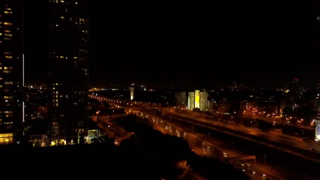 Tel-Aviv,-Israel,-Aerial-View-At-NightTel-Aviv,-Israel,-Aerial-View-of-ayalon-highway,-city-skyline-at-night