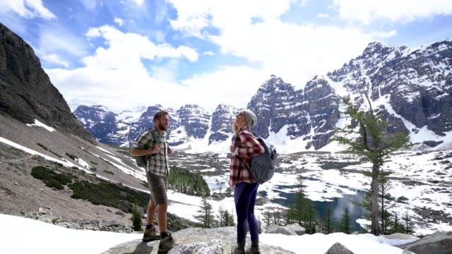 Young-couple-looking-at-views-and-contemplating-nature
