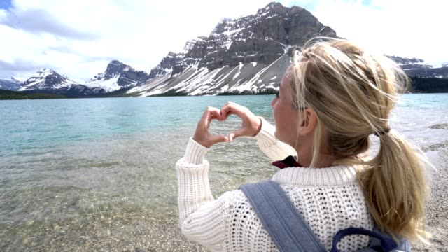 Cheerful-woman-loving-nature,-Banff-national-park,-Canada--4K
