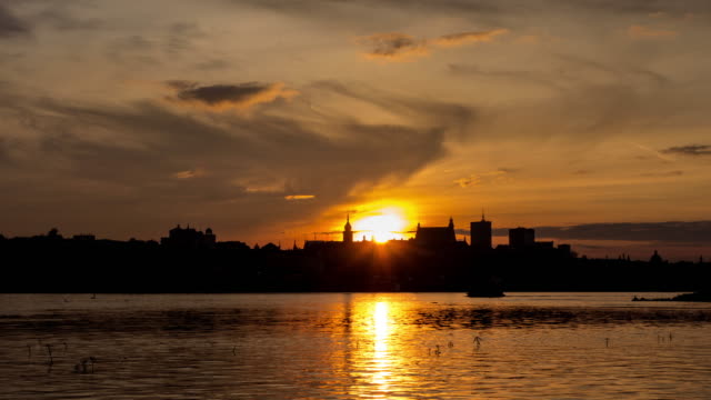 Time-Lapse-of-Warsaw-Old-Town-with-Vistula-river-at-sunset