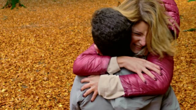 sweet-and-passionate-embrace-between-lovers-at-the-autumn-park