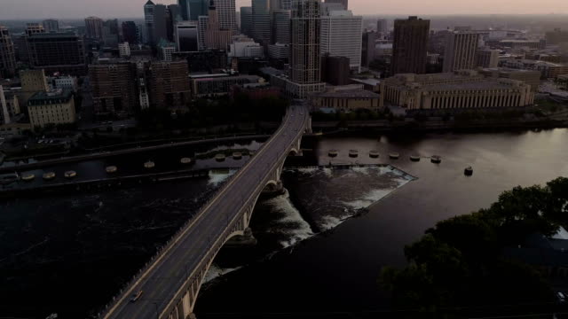 Aerial-Reveal-of-Minneapolis-at-Sunset---4K