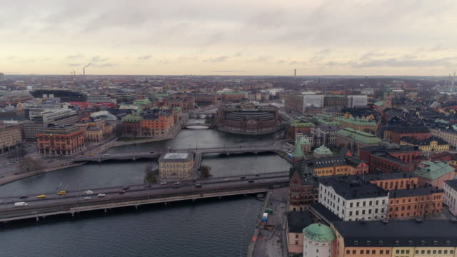 Stockholm-downtown-city-aerial-view.-Drone-shot-of-Stockholm-Gamla-stan-city-center,-buildings-and-bridge-over-water.-Capital-of-Sweden