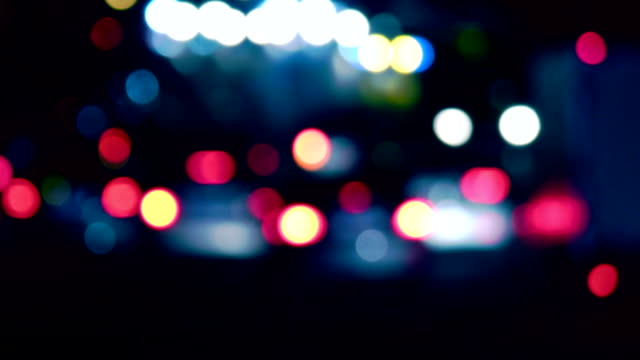 Traffic-in-the-city.-Avenue-Time-Lapse-in-Night-Time.-Heavy-traffic-flowing-with-blurred-motion.-Dusk