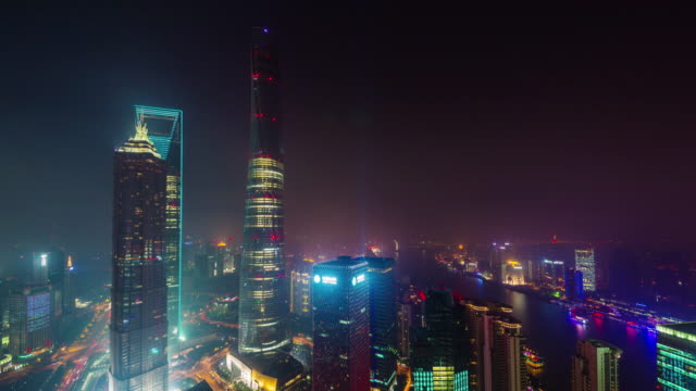 luz-de-la-noche-China-shanghai-panorama-del-superior-de-la-azotea-de-la-ciudad-edificios-centro-4k-lapso-de-tiempo