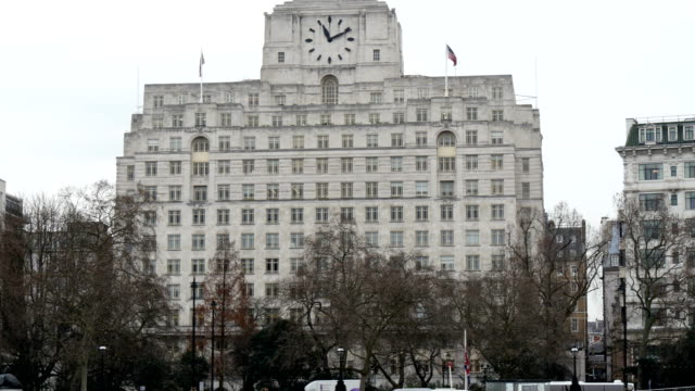 The-huge-white-building-with-a-black-clock-on-top