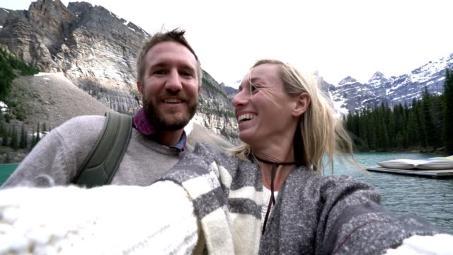 Selfie-of-young-couple-on-mountain-at-Moraine-lake