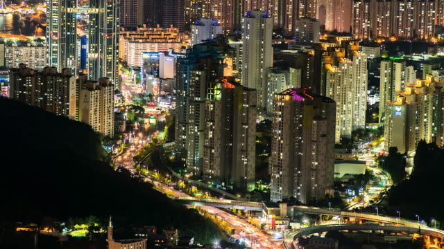 4K,-Time-lapse-view-of-Busan-city-buildings-at-night-of-South-Korea