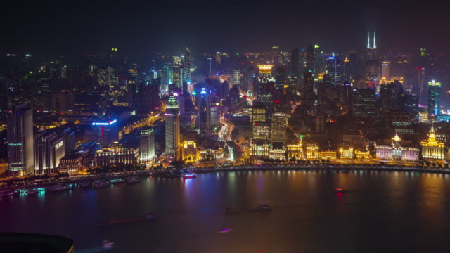 luz-de-la-noche-China-Shangai-viejo-ciudad-Bahía-cubierta-superior-aéreo-panorama-4k-lapso-de-tiempo