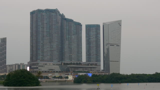 China-crepuscular-atardecer-Macao-ciudad-centro-famoso-hotel-Bahía-4k