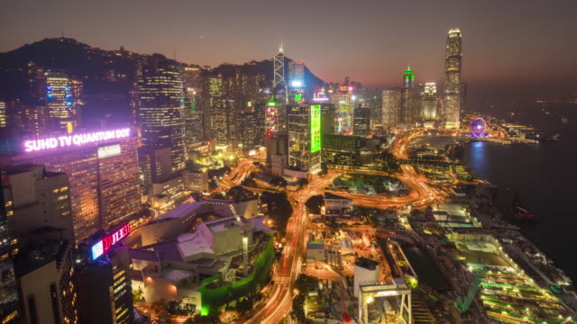 China-Sonnenuntergang-Nacht-Licht-Hong-Kong-auf-dem-Dach-Verkehr-Bucht-Stadtpanorama-4k-Zeitraffer