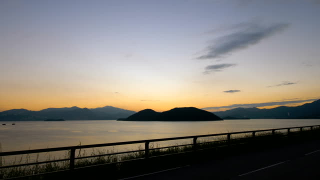 Sunset-in-Hong-Kong-Tai-Mei-Tuk-from-Dam-by-4k-video