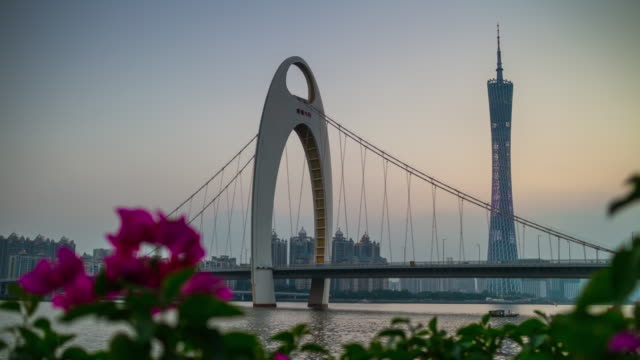 puesta-de-sol-cantón-Cantón-torre-puente-Bahía-flores-4k-timelapse-china