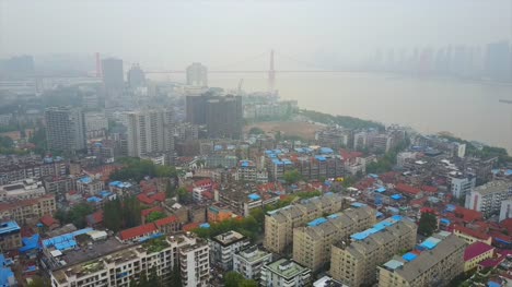 china-day-time-wuhan-cityscape-famous-riverside-bridge-aerial-panorama-4k
