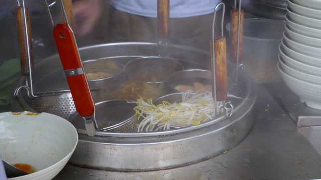 shenzhen-city-famous-street-food-boiling-soup-slow-motion-4k-china