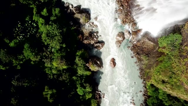 Waterfall-in-Himalayas-range-Nepal-from-Air-view-from-drone