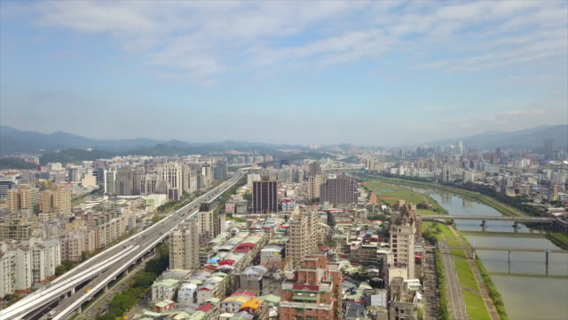 taiwan-taipei-cityscape-sunny-day-traffic-road-and-river-bridge-aerial-panorama-4k